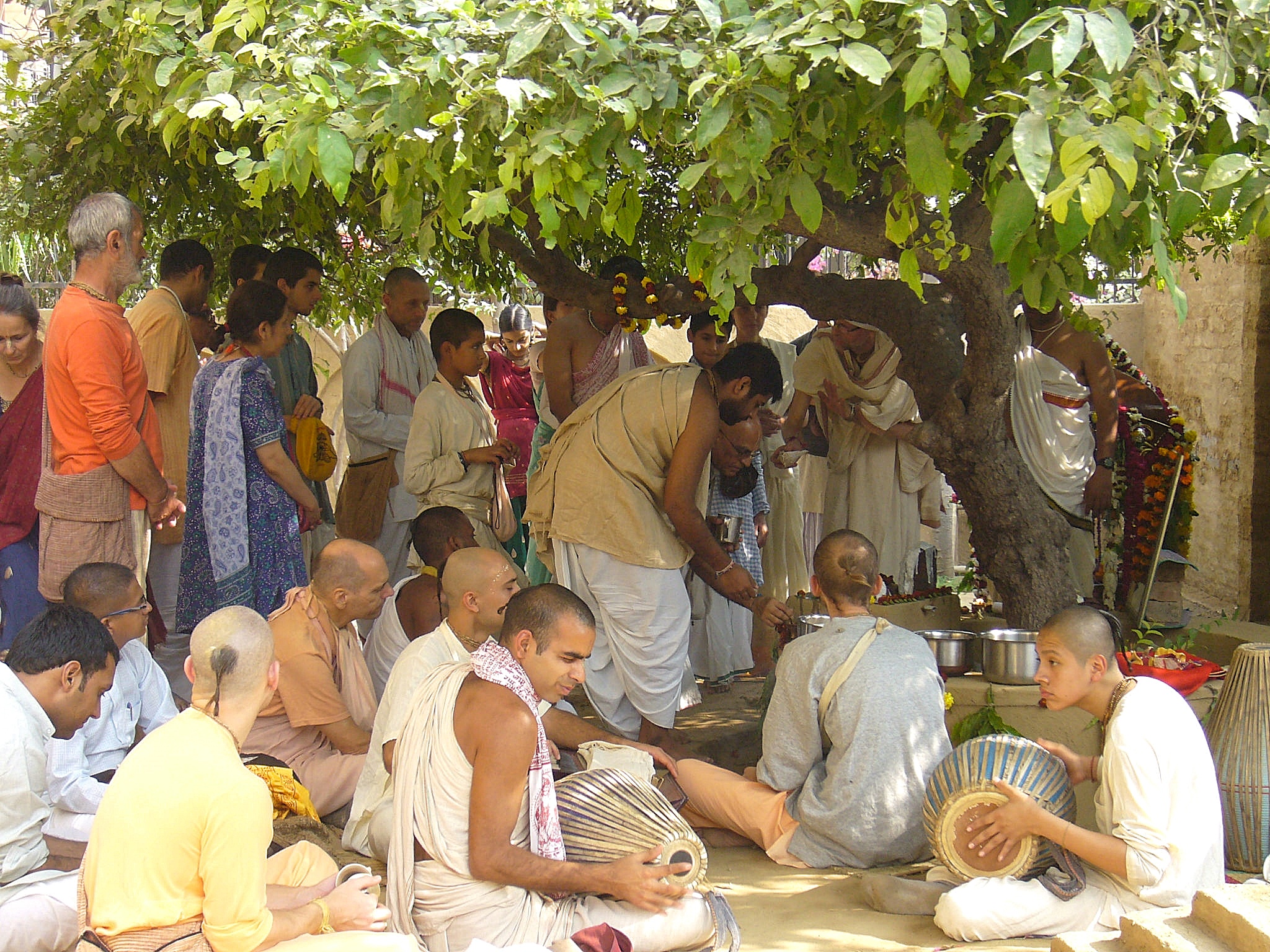 Devotees at a courtyard festival